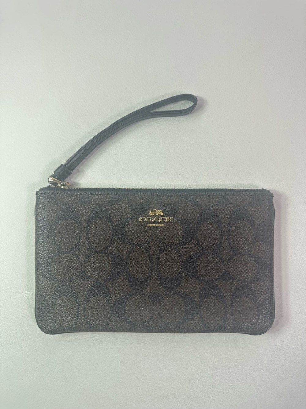 Pre-ownedCoach Brown/Black Signature Zip Wristlet with Gold Hardware